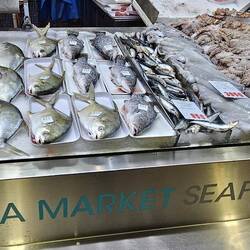 Oysters, AU$22.99/dozen; that's ~US$1.40/ea