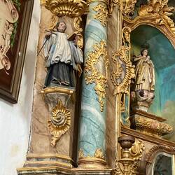 Close up, same church. The marble appears painted as the pattern is same on all the marble parts