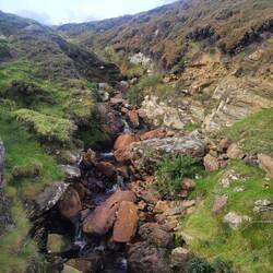 A small stream by the parking lot at Keem Beach.
