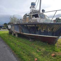 Randy got a kick out of the supports for this old fishing boat. Empty guiness kegs.