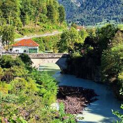 The water is usually emerald green but cloudy and log jam with runoff in the Soči.