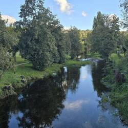 View of the river from the footbridge.This part of Spain is surprisingly green for this time of year