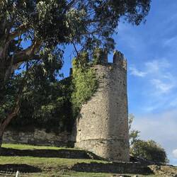 A single lookout tower is all that remains of the Castle of Sarria at the top of the hill