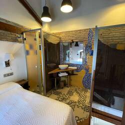 Upstairs - walls of toilet & shower contain coffee beans