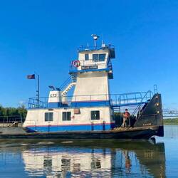 Moving a barge to make room for the loopers