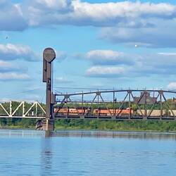 Train on the rail bridge
