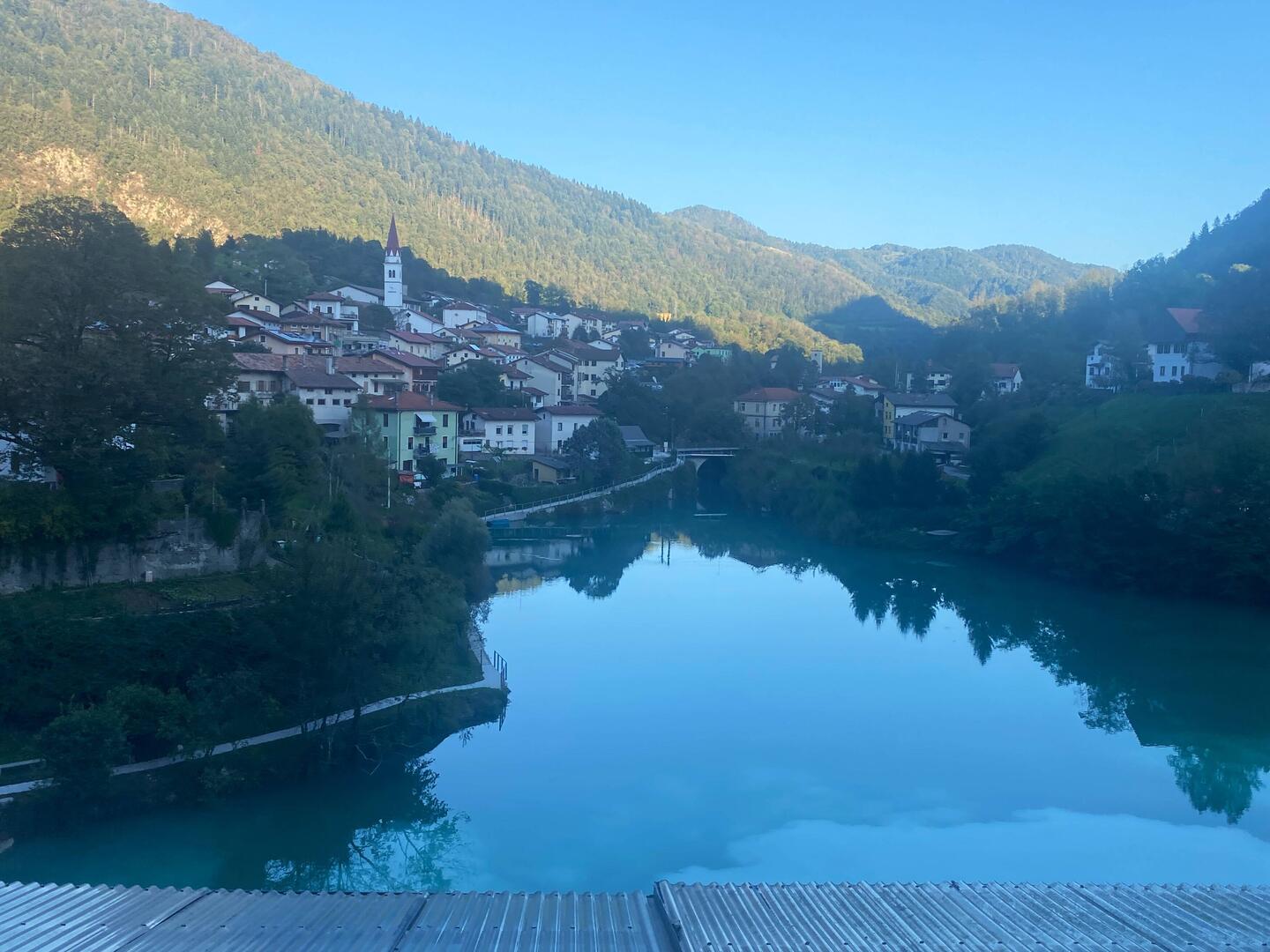 Most na Soči as the sun is retreating behind the mountain.