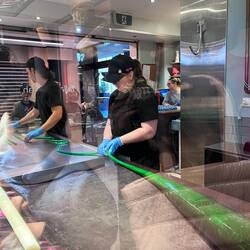 The large glob is pulled into a thinner snake and the shape is more visible