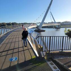 The Peace Bridge is a pedestrian and cycle bridge. Lots of dogs out for a walk.