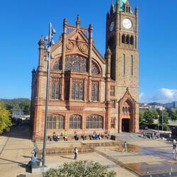 The Guildhall was a gathering place for people and pigeons. It was outside the walls.