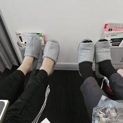 Proudly showing of our JAL slippers and our compression socks.