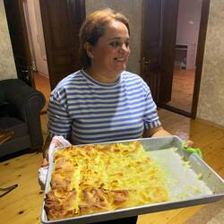 Tamari's mom, Natia, with an amazing noodle dish that takes nine hours to prepare
