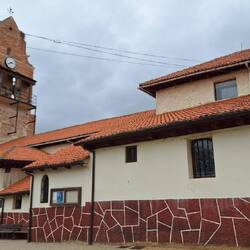 The backend of the bell tower of the church in Villadangos.