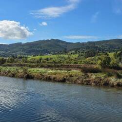 Lovely views over the river and up into the distant mountains
