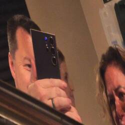 Not paying attention and doing selfies in the reflection of the equipment
