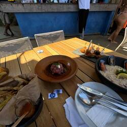 Whitebait, Tuna Tartare, Seafood Risotto, Bacalao Fritters.