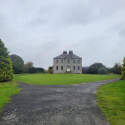The Dark Hedge was planted to create an imposing entrance to this manor house.