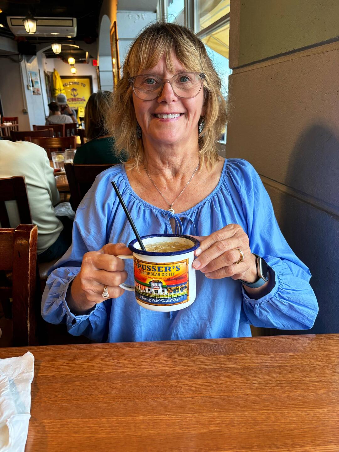Pusser's with the souvenir tin cup