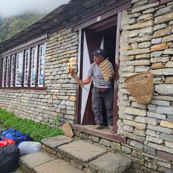 Angtu starting a fire. He has a great sense of humor