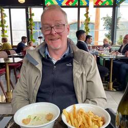 Ian enjoying a lunch of eggs poached in a cheese sauce