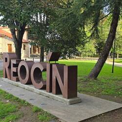 Town had a large shady park, with large sign for pilgrims to pose by