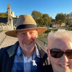 Selfie on the bridge with a bit of the Popes Palace behind