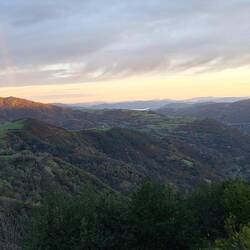 Sunrise on the other side of the ridge.