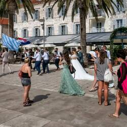 It was a long wedding walk in the hot afternoon sun to their ceremony