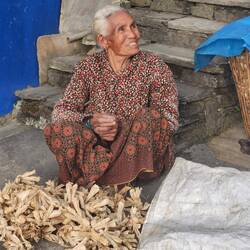 90 years old & tieing corn husks for the cattle
