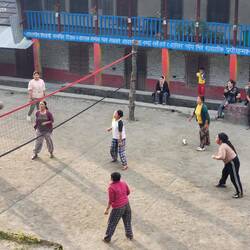 Local women playing volleyball