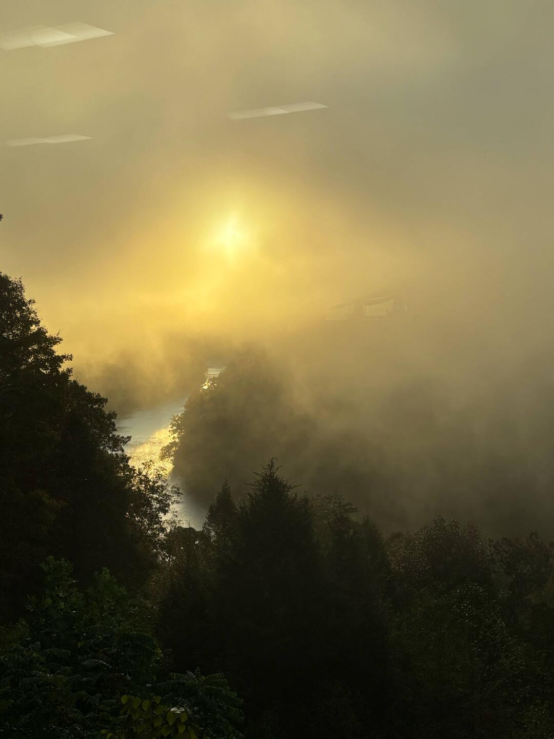 Sunrise in the mist over the Cumberland River, KY