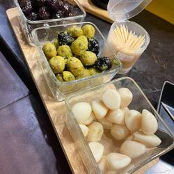 Olives and pickled garlic gloves