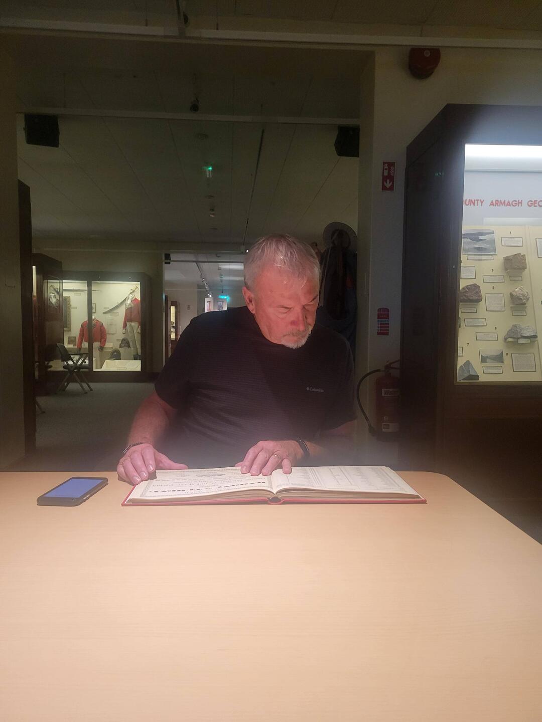 Randy looking through the tax roles in the Armagh Town archives