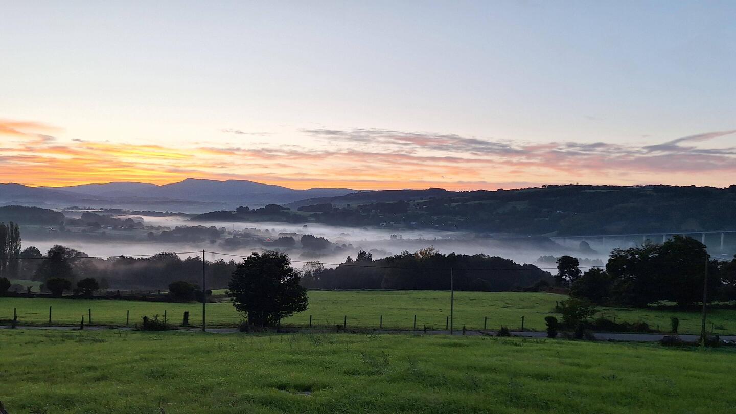 The mist sitting on the lower ground really set off the sunrise.