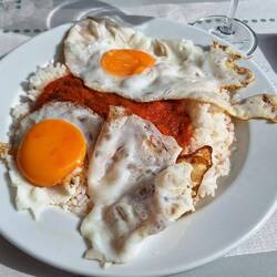 Ordered Cuban rice, got rice with some tomato sauce and two fried eggs, tasted better than it looked