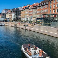 Locals taking advantage of a warm day on the canals.