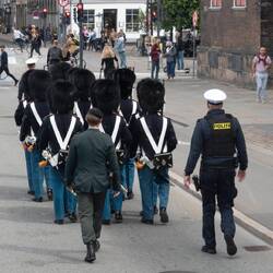 Changing of the Royal Guard as they march from their barracks through the streets to Amalienborg.
