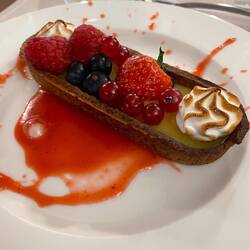 Citron tart with red fruits and coulis