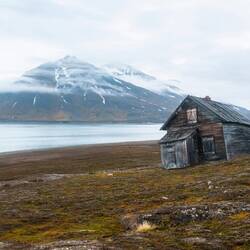 1904 hut that had slipped with the tundra down the hill.