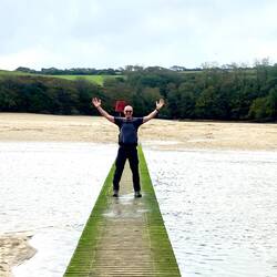 Footbridge across the Gannel River at low tide
