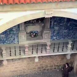 Busker, with a beautiful voice, at the gates to the old city in Obidos