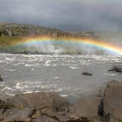 Rainbow on walk back from Selfoss Waterfall over the top of Detifoss.