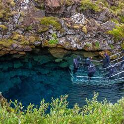 Silfra with snorkellers entering the water.