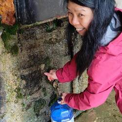 Joyce collecting water from La Font Vella