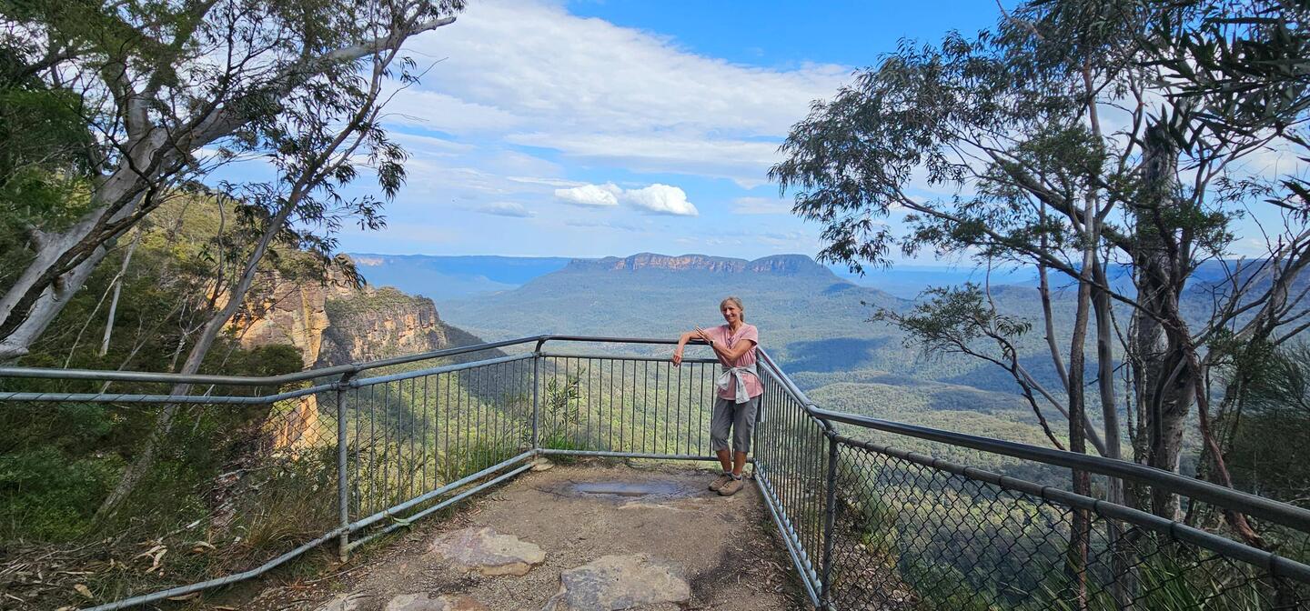 That's J9 trying to show this is our first day that we're hiking with only ONE layer of clothing!