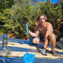 Caulking the cob pizza oven - first pizza was made a week later