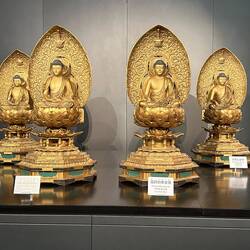 Buddhas of the 4 directions, reside in 4 paradises of the compass N, S, W, E . Wood with gold leaf.