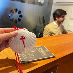 Picking up my pilgrim's credential and shell at the Porto Cathedral.