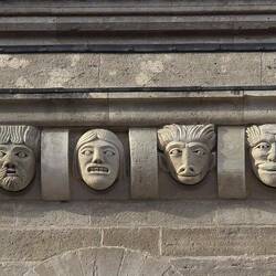 Gargoyle carvings on the outside south wall of the nave