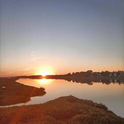 Die Sonne geht unter über der Ria Formosa